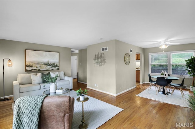 450 Forest Green Dr, Webster Groves, MO 63119 - living room featuring ceiling fan and light wood-style floors