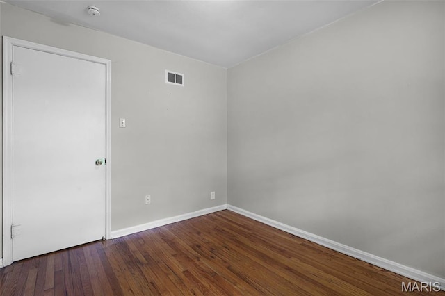 450 Forest Green Dr, Webster Groves, MO 63119 - unfurnished room featuring wood finished floors and a smoke detector
