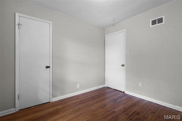 450 Forest Green Dr, Webster Groves, MO 63119 - unfurnished room featuring wood finished floors and baseboards