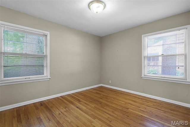 450 Forest Green Dr, Webster Groves, MO 63119 - spare room with baseboards and wood finished floors