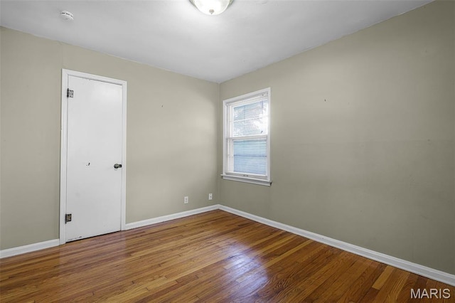 450 Forest Green Dr, Webster Groves, MO 63119 - spare room with wood finished floors and a smoke detector