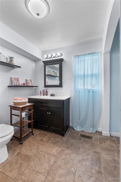 115 Whitener St, Marquand, MO 63655 - bathroom featuring vanity and a textured ceiling