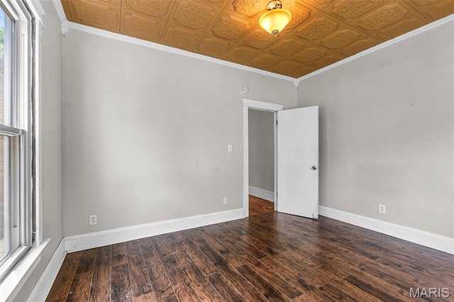 325 N Lorimier St, Cape Girardeau, MO 63701 - empty room featuring an ornate ceiling, crown molding, and wood finished floors