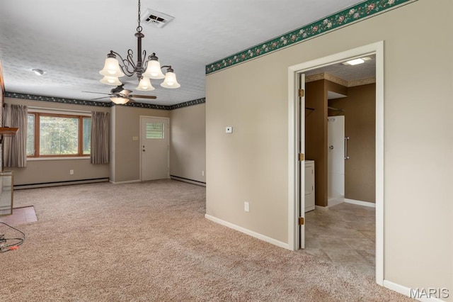 201 E Old Route 66, Mount Olive, IL 62069 - carpeted empty room featuring a baseboard radiator, a chandelier, ceiling fan, and a textured ceiling