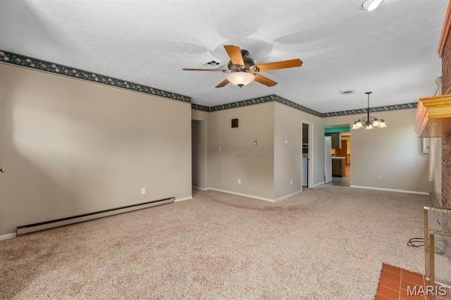 201 E Old Route 66, Mount Olive, IL 62069 - unfurnished living room featuring baseboard heating, a chandelier, a ceiling fan, and carpet