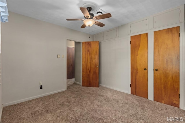 201 E Old Route 66, Mount Olive, IL 62069 - unfurnished bedroom featuring carpet floors, two closets, and ceiling fan