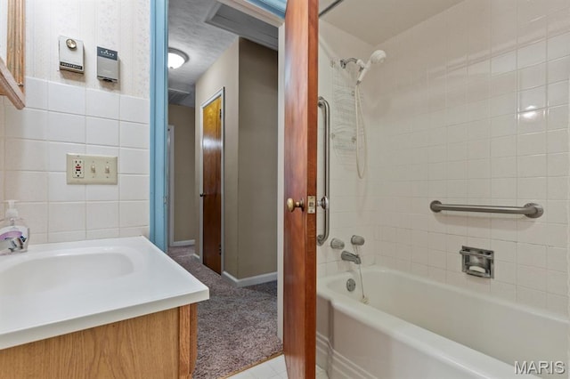 201 E Old Route 66, Mount Olive, IL 62069 - full bathroom with  shower combination, vanity, tile patterned flooring, and tile walls