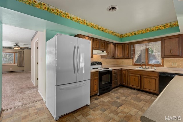 201 E Old Route 66, Mount Olive, IL 62069 - kitchen featuring freestanding refrigerator, electric stove, under cabinet range hood, dishwasher, and light stone finish floors