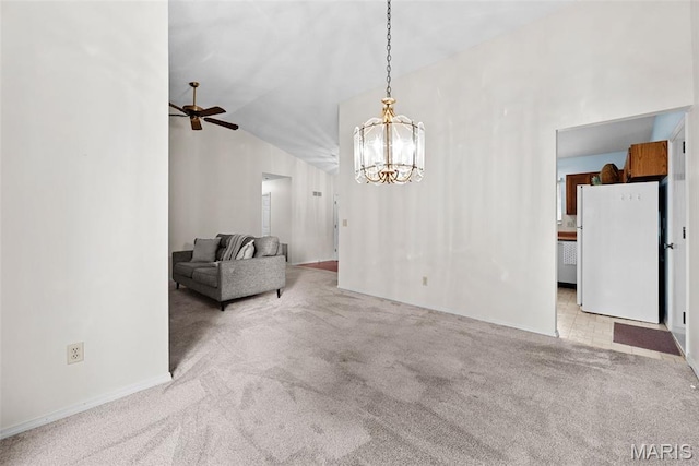 334 Devonshire Ct Unit A, Saint Peters, MO 63376 - living area with ceiling fan, a chandelier, carpet flooring, and vaulted ceiling