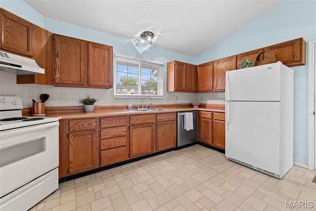 334 Devonshire Ct Unit A, Saint Peters, MO 63376 - kitchen with white appliances, under cabinet range hood, brown cabinets, vaulted ceiling, and backsplash