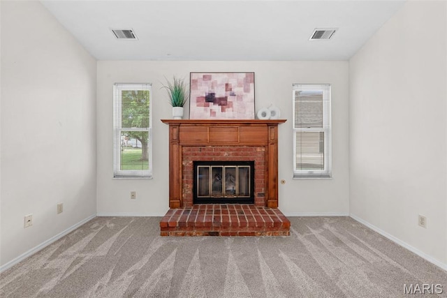 334 Devonshire Ct Unit A, Saint Peters, MO 63376 - unfurnished living room featuring a fireplace and carpet