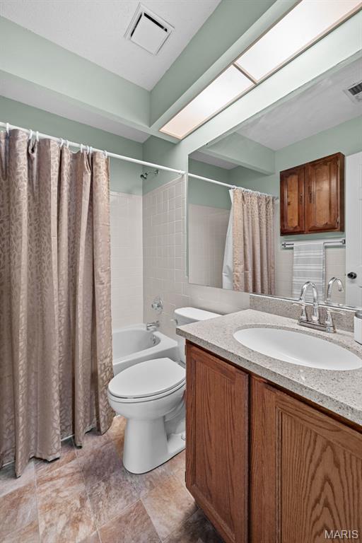 334 Devonshire Ct Unit A, Saint Peters, MO 63376 - full bathroom featuring vanity and shower / bath combo