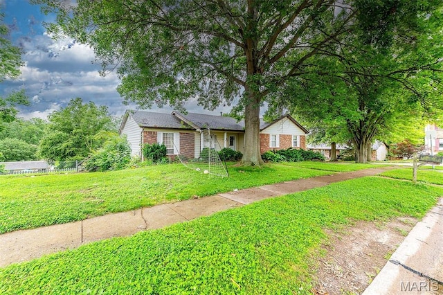 6048 La Chateau Ct, Saint Louis, MO 63129 - single story home with brick siding and a front lawn