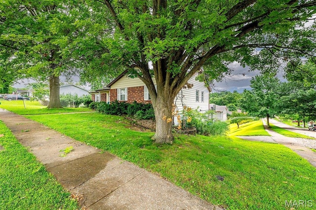 6048 La Chateau Ct, Saint Louis, MO 63129 - view of front of property with brick siding and a front lawn