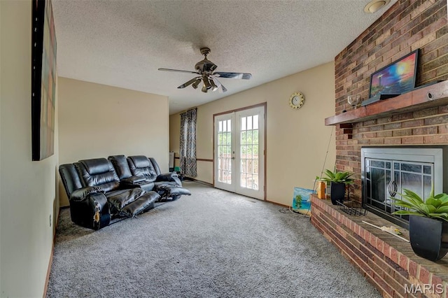6048 La Chateau Ct, Saint Louis, MO 63129 - living room with carpet floors, a textured ceiling, french doors, a fireplace, and a ceiling fan