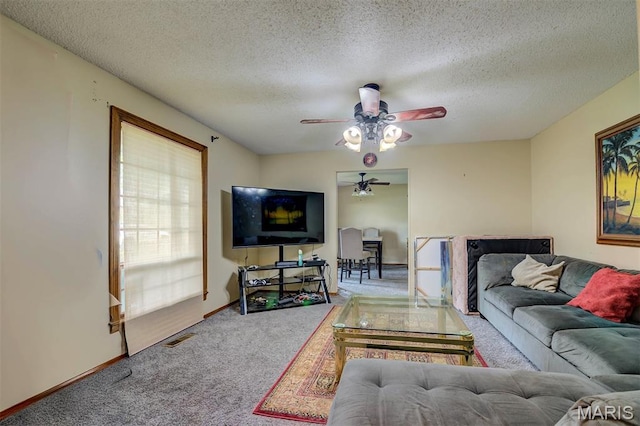 6048 La Chateau Ct, Saint Louis, MO 63129 - living area featuring carpet flooring, ceiling fan, and a textured ceiling