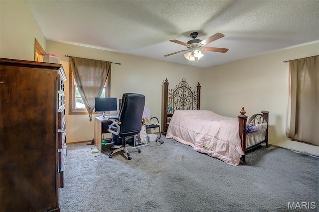 6048 La Chateau Ct, Saint Louis, MO 63129 - bedroom featuring carpet floors, a textured ceiling, ceiling fan, and an office area