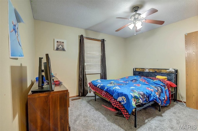 6048 La Chateau Ct, Saint Louis, MO 63129 - carpeted bedroom featuring ceiling fan and a textured ceiling