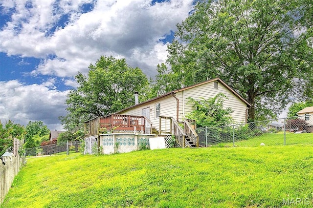 6048 La Chateau Ct, Saint Louis, MO 63129 - fenced backyard featuring a deck and stairs