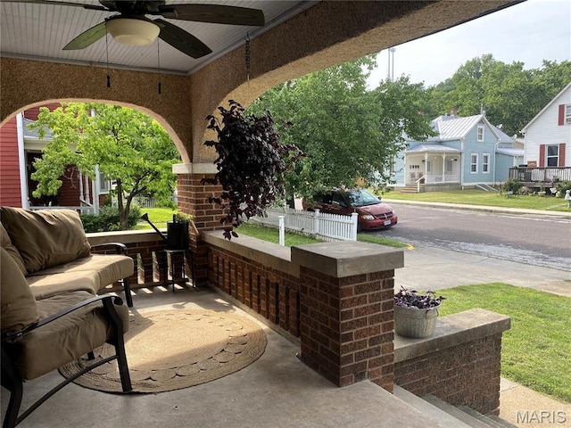 218 W 6th St, Hermann, MO 65041 - porch featuring a ceiling fan