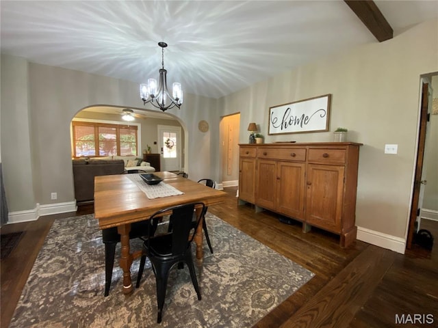 218 W 6th St, Hermann, MO 65041 - dining space featuring arched walkways, a chandelier, and dark wood finished floors