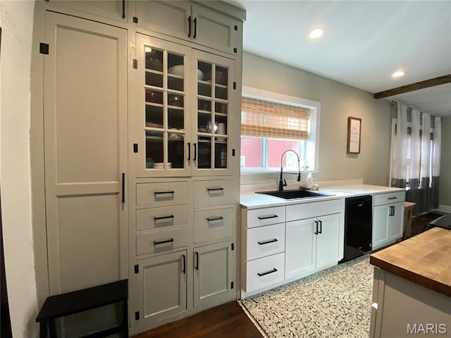 218 W 6th St, Hermann, MO 65041 - kitchen featuring dishwasher, recessed lighting, wood counters, dark wood-style floors, and glass insert cabinets