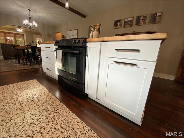 218 W 6th St, Hermann, MO 65041 - kitchen featuring black electric range, arched walkways, a chandelier, white cabinets, and dark wood-type flooring
