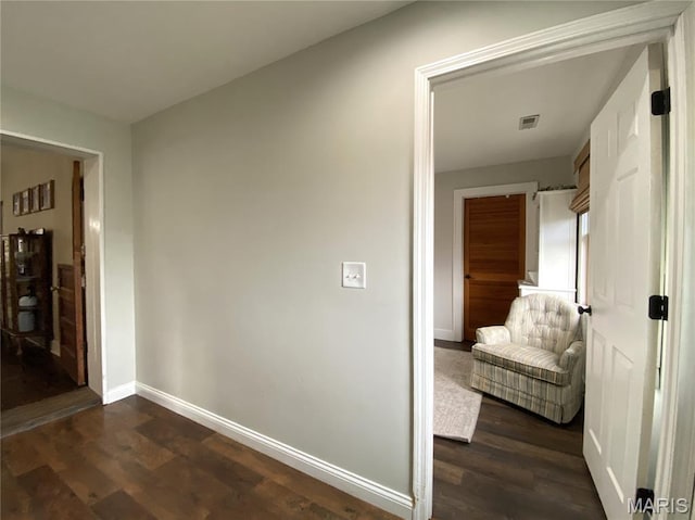 218 W 6th St, Hermann, MO 65041 - hall featuring dark wood-style flooring