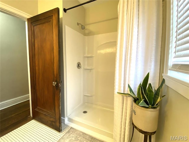 218 W 6th St, Hermann, MO 65041 - bathroom with a shower with curtain and baseboards
