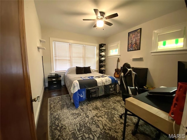 218 W 6th St, Hermann, MO 65041 - bedroom featuring multiple windows, a desk, and a ceiling fan
