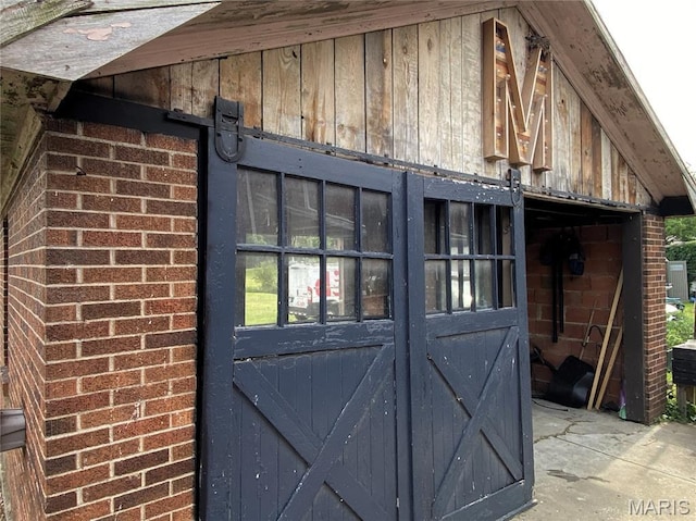 218 W 6th St, Hermann, MO 65041 - doorway to property featuring brick siding