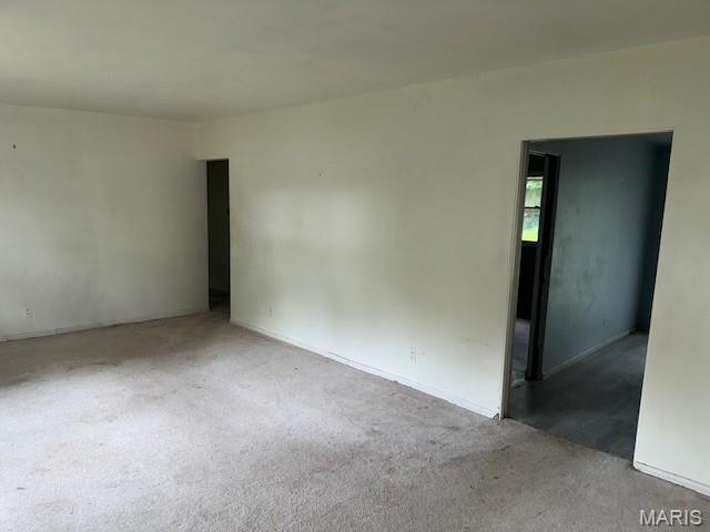 207 Hunter St, Lebanon, IL 62254 - carpeted spare room featuring baseboards