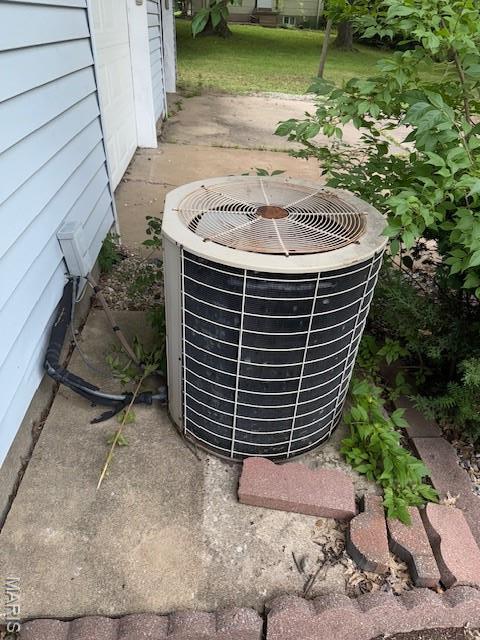 207 Hunter St, Lebanon, IL 62254 - exterior view of a central AC unit