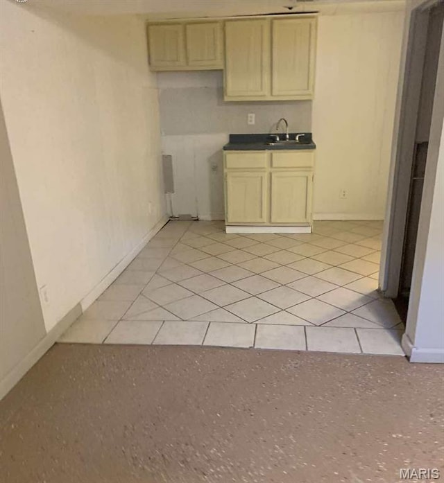1005 Burford Ct, Doniphan, MO 63935 - kitchen featuring light tile patterned floors and dark countertops