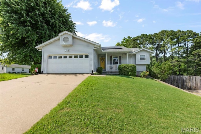1802 Old Cape Rd, Jackson, MO 63755 - view of front of home featuring a porch, an attached garage, driveway, and roof mounted solar panels