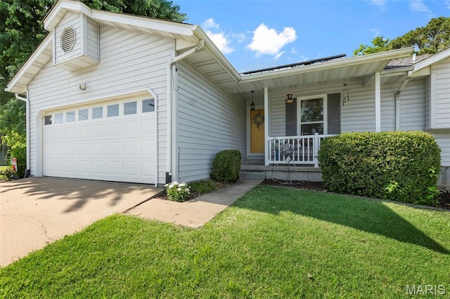 1802 Old Cape Rd, Jackson, MO 63755 - view of front facade with a porch, a garage, a front lawn, and concrete driveway