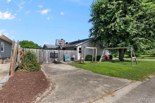 1802 Old Cape Rd, Jackson, MO 63755 - view of front of house with a playground
