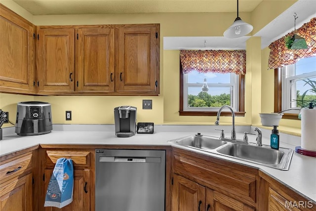 1802 Old Cape Rd, Jackson, MO 63755 - kitchen featuring stainless steel dishwasher, brown cabinets, and light countertops