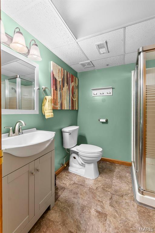 1802 Old Cape Rd, Jackson, MO 63755 - full bath featuring vanity, a paneled ceiling, and a shower stall