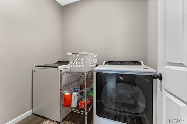 2333 Cabric Dr, Saint Charles, MO 63301 - laundry room with washer and dryer and wood finished floors