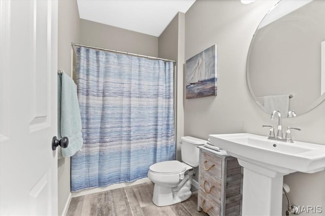 2333 Cabric Dr, Saint Charles, MO 63301 - full bath with wood finished floors and toilet