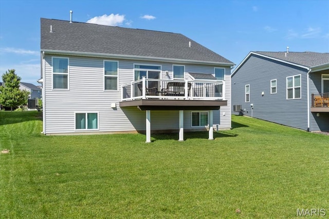 2333 Cabric Dr, Saint Charles, MO 63301 - back of property featuring a lawn and a wooden deck