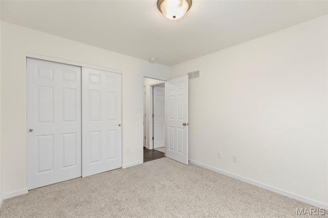 262 Liberty Valley Dr, Foristell, MO 63348 - unfurnished bedroom featuring carpet and a closet