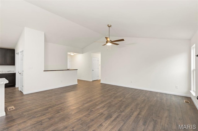 262 Liberty Valley Dr, Foristell, MO 63348 - unfurnished living room with lofted ceiling, a ceiling fan, and dark wood-type flooring