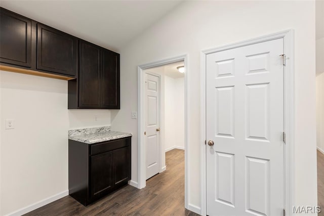 262 Liberty Valley Dr, Foristell, MO 63348 - kitchen with dark wood finished floors, dark brown cabinets, and vaulted ceiling