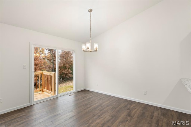 262 Liberty Valley Dr, Foristell, MO 63348 - empty room featuring dark wood-style floors and a chandelier