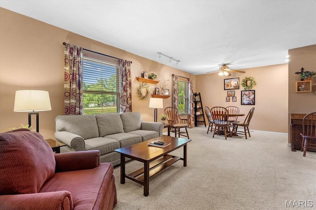 334 Hazel Ave, Belleville, IL 62223 - living room featuring light carpet, rail lighting, and a ceiling fan