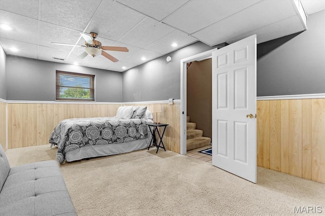 334 Hazel Ave, Belleville, IL 62223 - bedroom featuring a wainscoted wall, carpet flooring, wood walls, ceiling fan, and a paneled ceiling