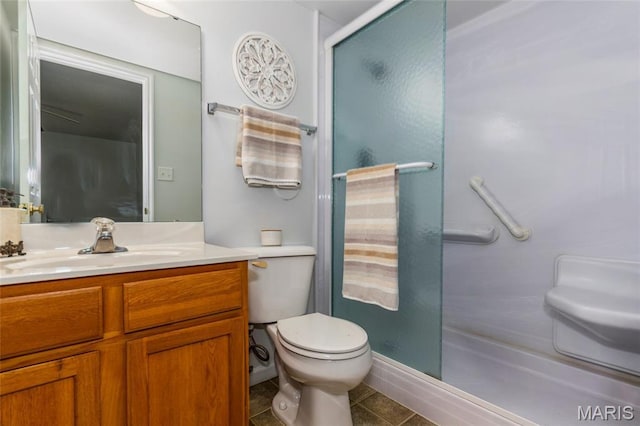 1924 Greenglen Dr Unit 102, Kirkwood, MO 63122 - bathroom featuring a stall shower, tile patterned floors, and vanity