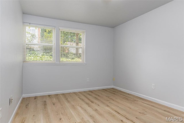 1924 Greenglen Dr Unit 102, Kirkwood, MO 63122 - empty room with light wood-type flooring and baseboards
